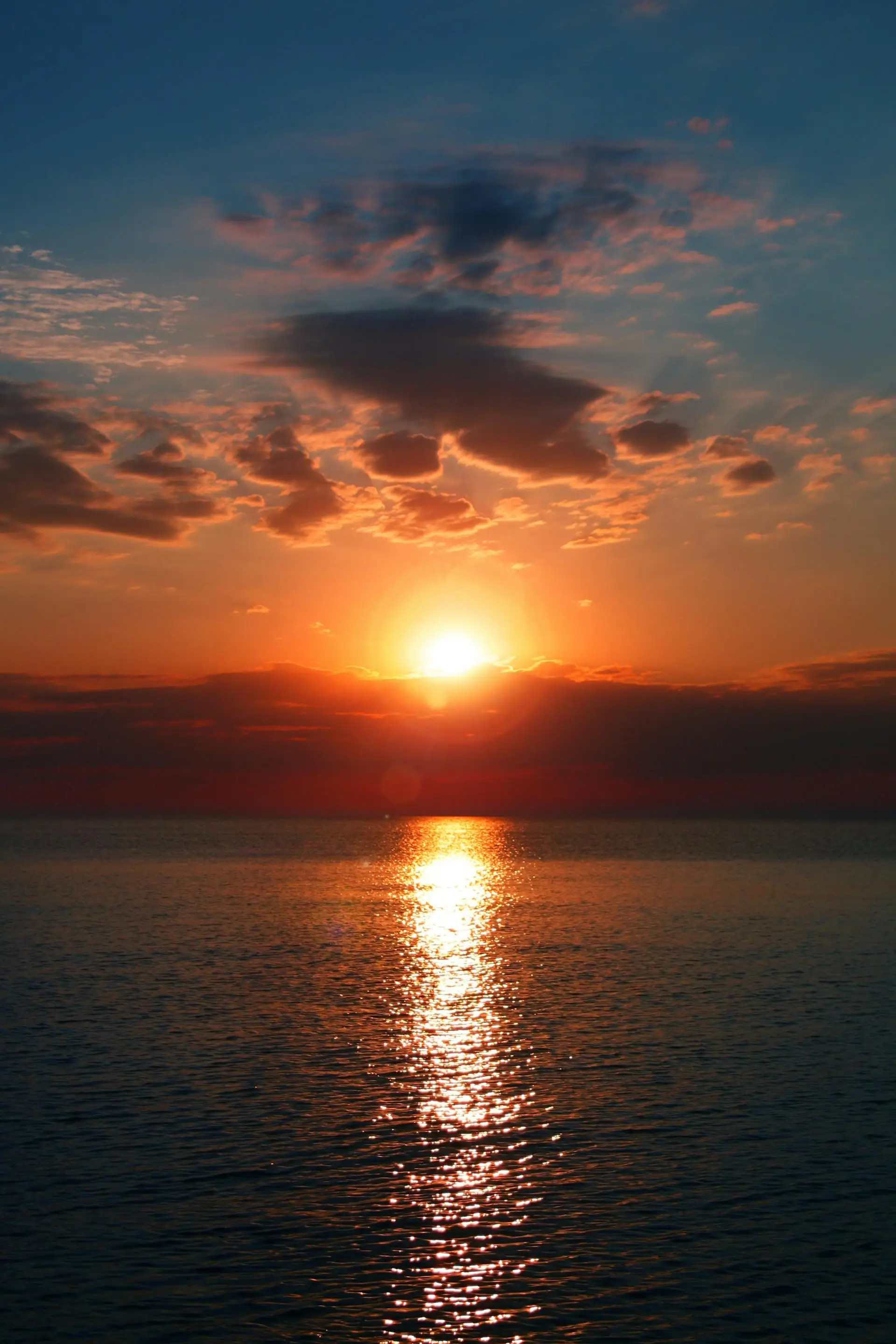 Golden sunset reflecting over calm Mediterranean Sea waters on the Costa Blanca